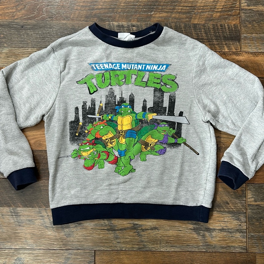TMNT Teenage Mutant Ninja Turtles juniors sweatshirt. Gray w/blue trim Sz Medium